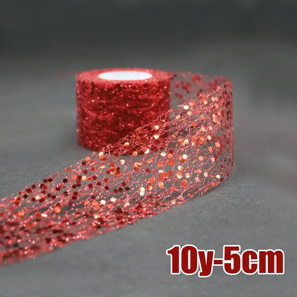 

Серебристый блестящий тюль в рулоне 5 см