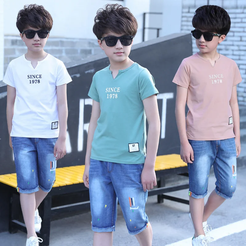 

Костюм для мальчиков Новинка Лето 2022 Повседневный с буквенным принтом с коротким рукавом корейские джинсы Детский комплект из двух предмет...
