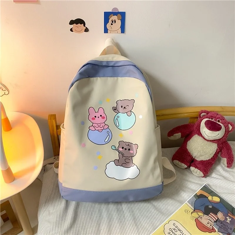 

2023 New Schoolbag Female Korean Version Small Fresh Junior High School Campus Backpack Hit Color Cartoon Cute Girl Bag