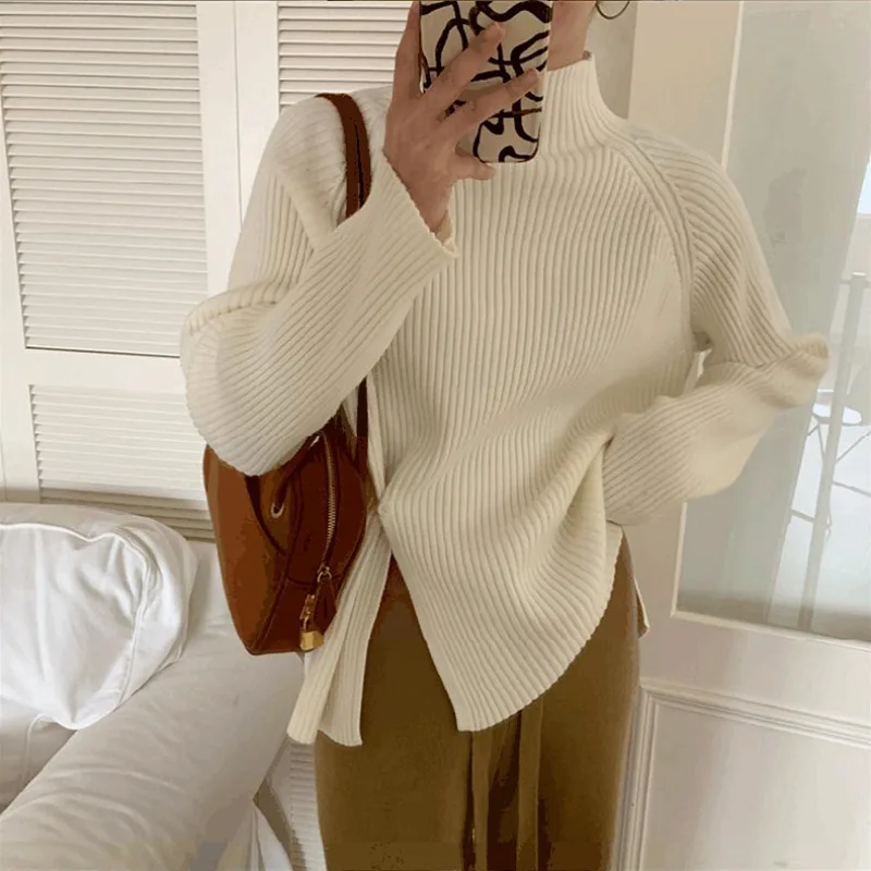 

Sweater women's thick long-sleeved tops in autumn and winter have a sense of design.
