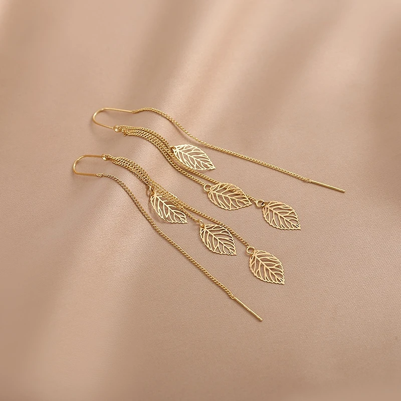 

Leaf Tassel Ear Line Female Long Hollow Leaf Earrings Temperament Unique Design Ear Jewelry