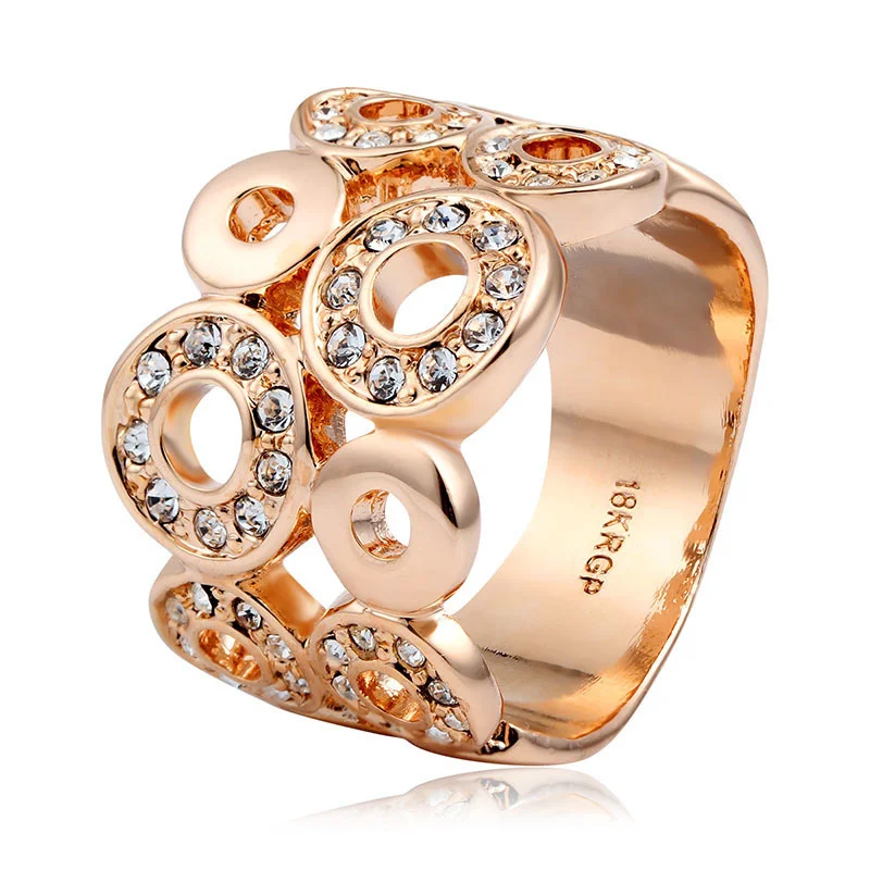 Кольцо женское розовое золото с несколькими вырезами круглые фианитами | Кольца