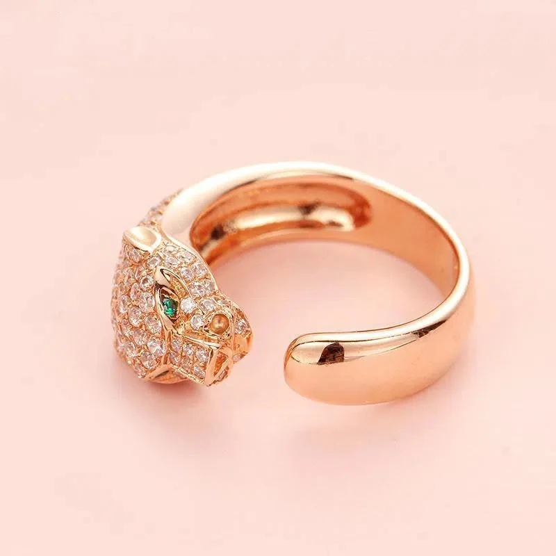 Женское кольцо из розового золота 14 к, с инкрустацией в виде головы леопарда из 585 фиолетового золота