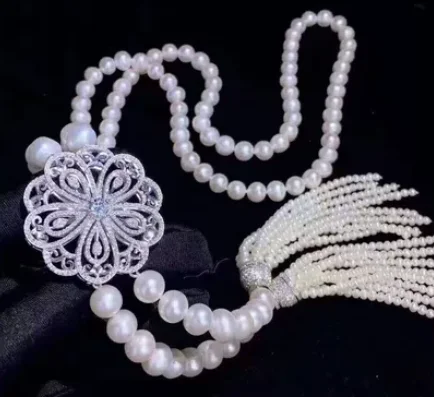 

Hand knotted 8-9mm white freshwater pearl mHand knotted 8-9mmicro inlay zircon accessories tassels sweater necklace long 28”