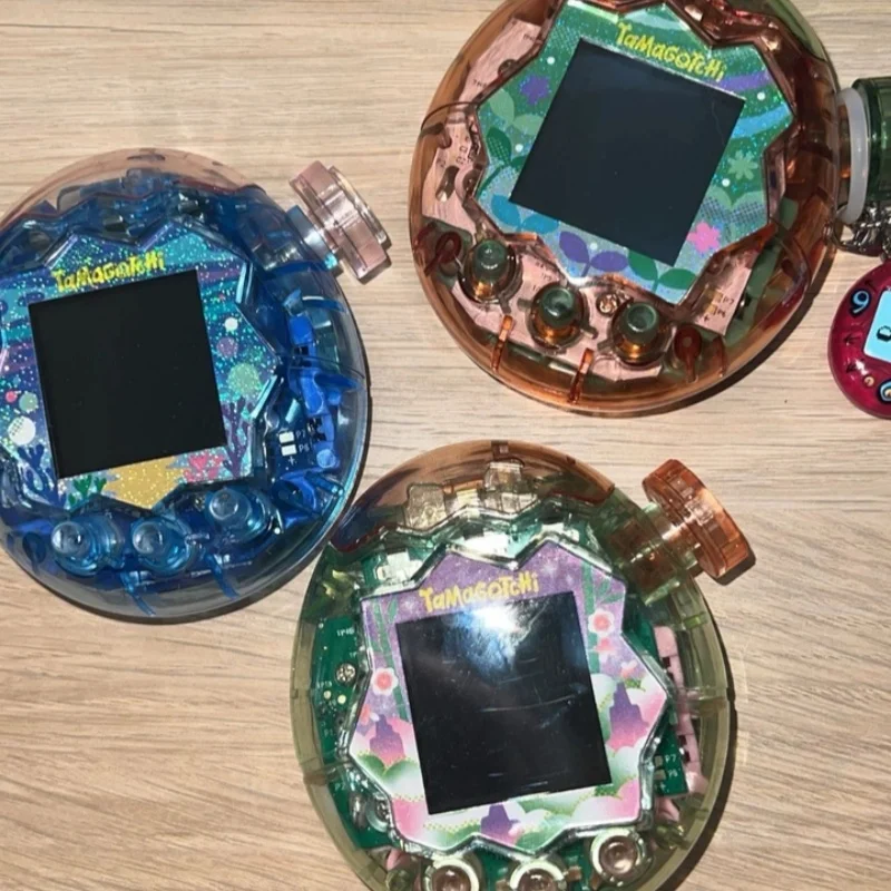 Фото Защитный чехол Paradise Replacement Cover Color Block Laser Glitter Transparent для Tamagotchi Paradise №3