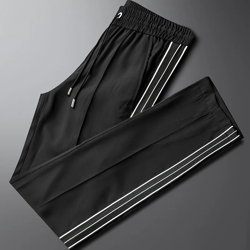 Ice silk black casual sports pants men's summer thin fashion webbing loose sag wide leg long pants trend