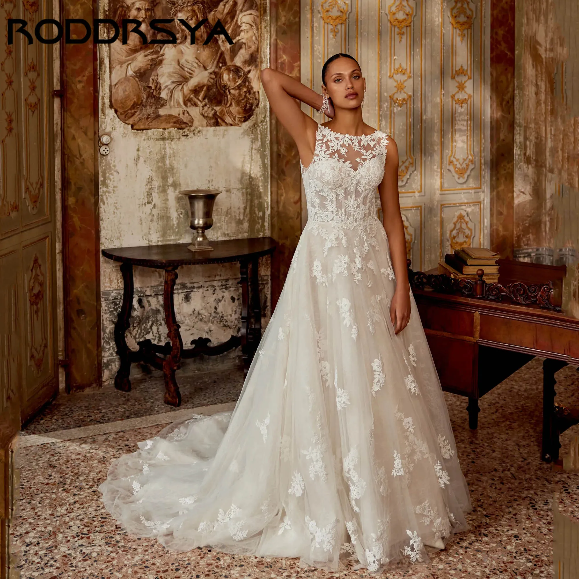 Фото RODDRSY Роскошные свадебные платья из тюля с аппликацией, классическое свадебное платье трапециевидной формы без рукавов с круглым вырезом и открытой спиной, платья de novia по индивидуальному заказу №1