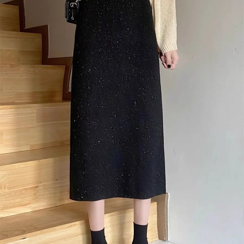 Осенне-зимняя женская трапециевидная юбка средней длины с запахом и разрезом