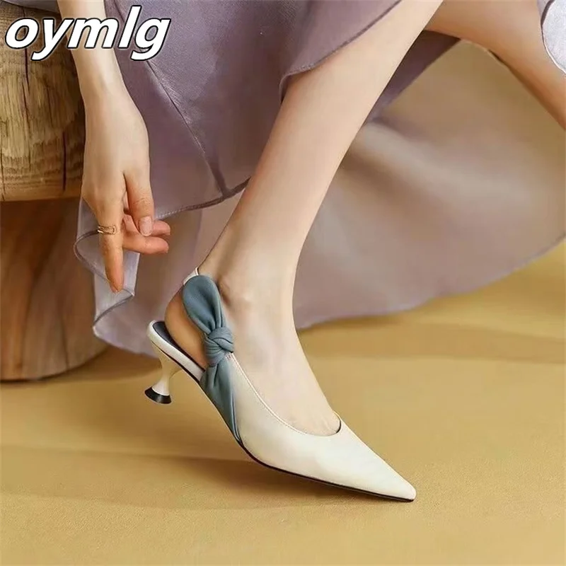 

Temperament pointed toe high heels 2022 summer new soft sheepskin shallow mouth bow word with stiletto sandals women