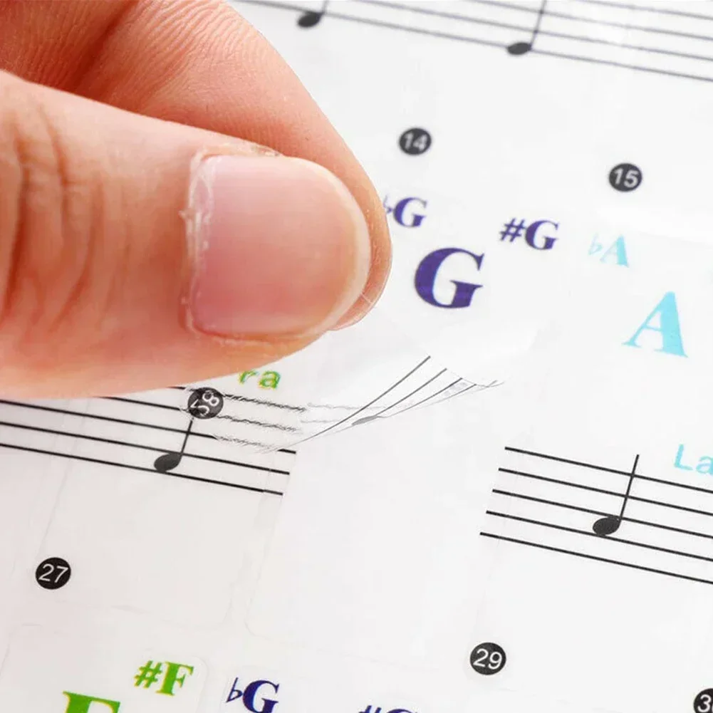 Развлечение обучения фортепиано с прозрачными и красочными наклейками на