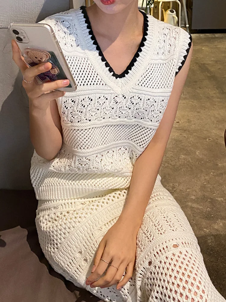 

Casual knitted suit 2022 summer hollow color matching knitted vest + fishtail fringed skirt two-piece fashion women's clothing