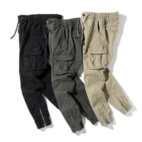 mens pants solid color elastic waist trousers mens cargo pants spring autumn new multi pocket tie up casual pants