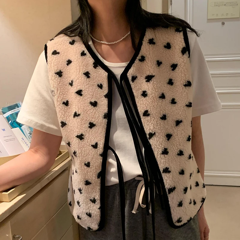 

Clothland Women Elegant Print Waistcoat Lace Up Sleeveless Vest Female Outwear Fashion Thick Jacket Coat Mujer MA128