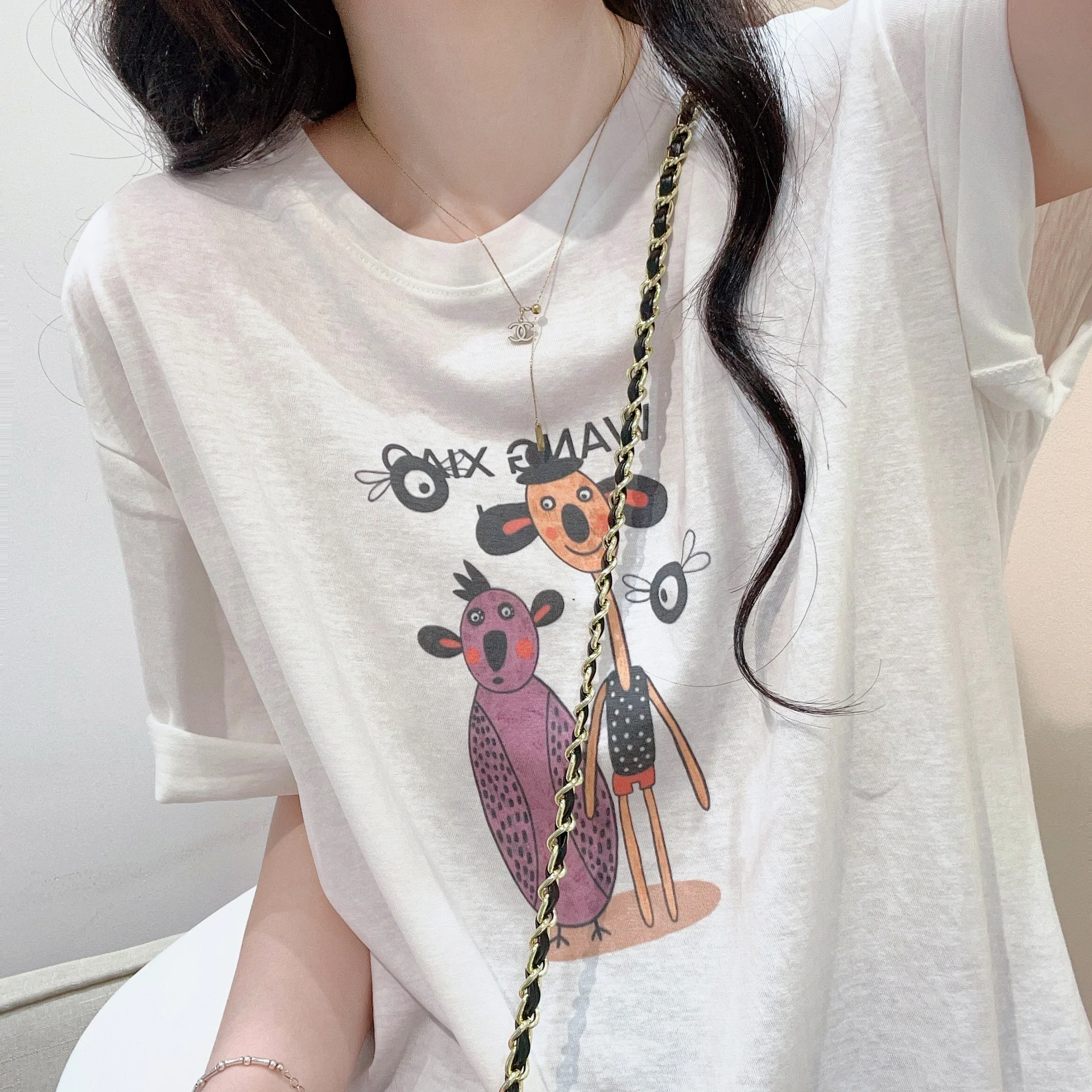 Розовая футболка с короткими рукавами и мультяшным принтом женская летняя