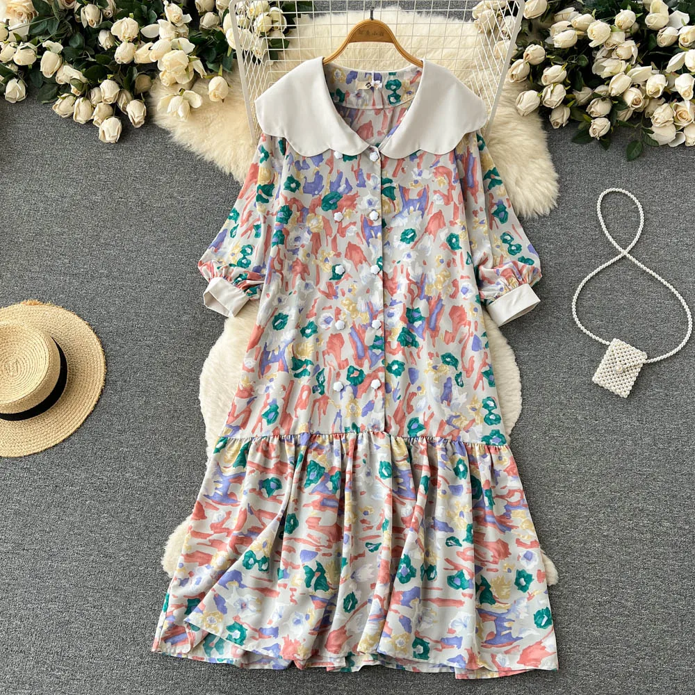 

Autumn New Sweet College Style French Floral Doll Collar Loose Hem Dress Woman