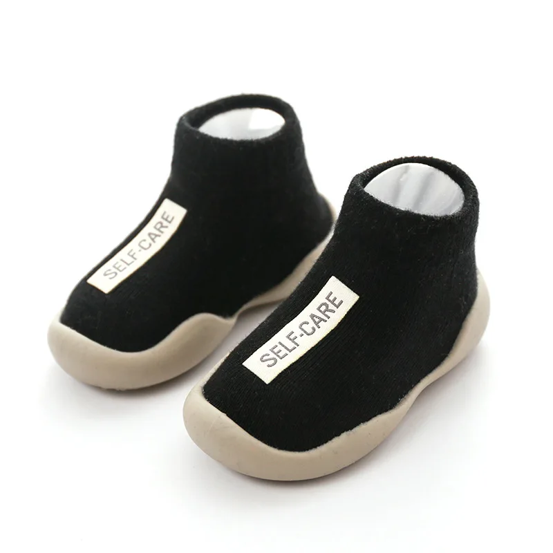 

2023 Toddler Shoes First Shoes Baby Walkers New Unisex Baby First Walker Kids Soft Rubber Sole Shoe Black Knit Booties Anti-slip