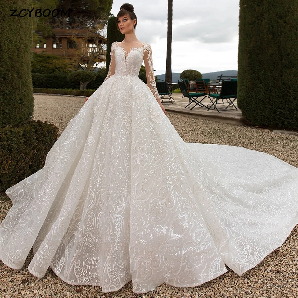 

Luxury Lvory Scoop Neck Appliques Sequin Wedding Dresses 2023 A-Line Floor Length Court Train Long Sleeves Buttons Bridal Gown