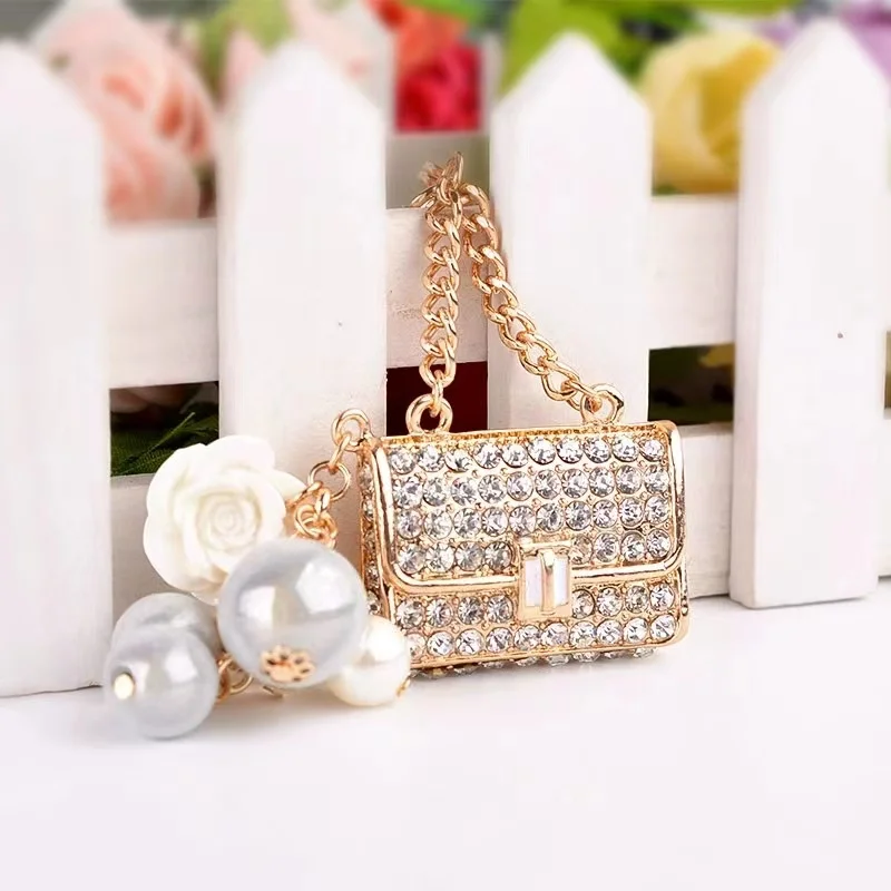 

Creative Fashion Pearl Bag Alloy Rhinestone Key Chain For Women Luxury Exquisite Girl's Car Keychains Pendant Small Gift Llavero
