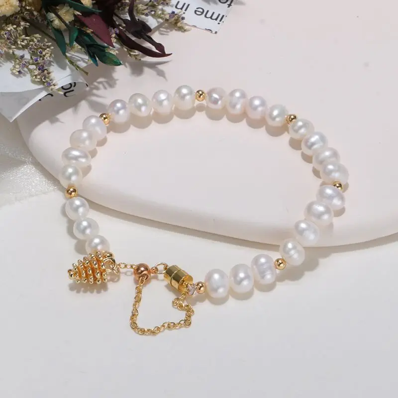 

Icnway natural white 5-6mm baroque freshwater pearl 14kgp bracelet wholesale