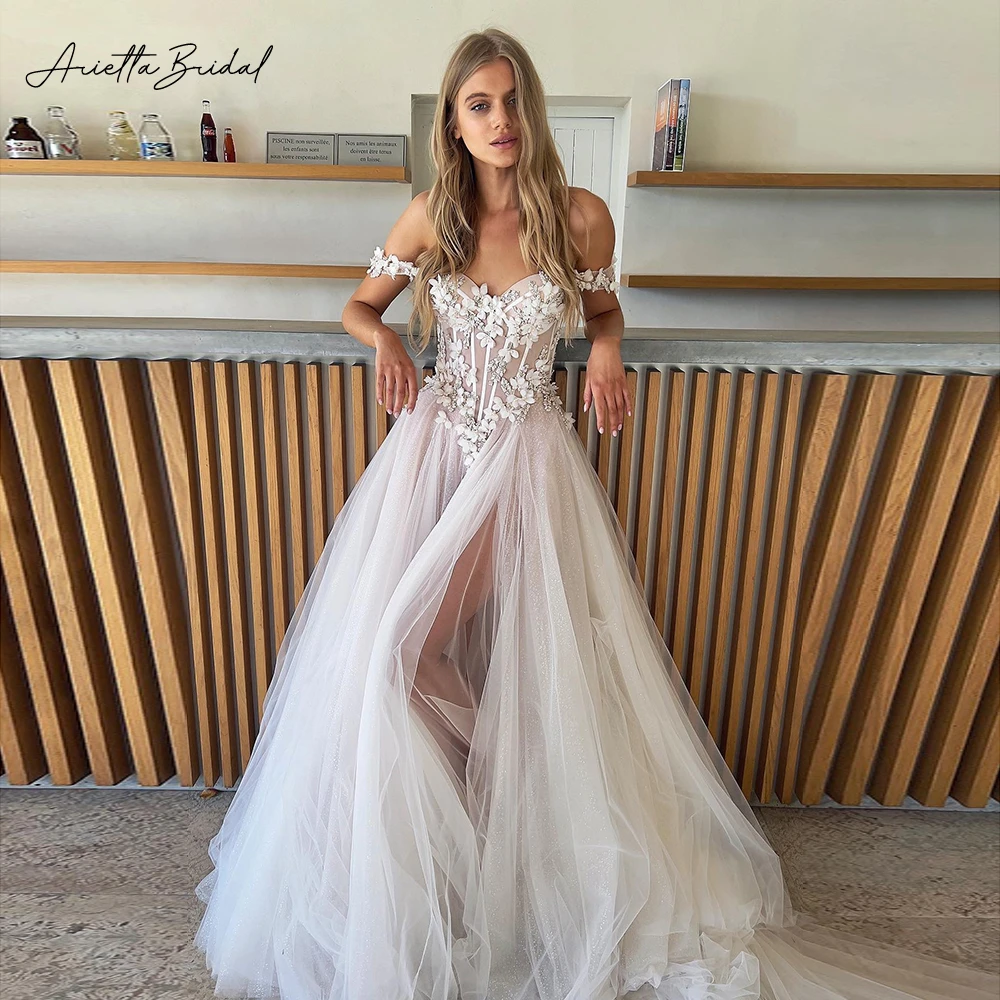 

Arietta Sweetheart Glitter Tulle Beach Wedding Dresses Off the Shoulder Lace Appliques Basque High Slit A-Line Bridal Gowns