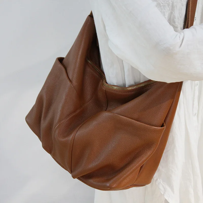 

EUMOAN First layer cowhide messenger bag women's new Korean version large bag women's bag large capacity casual shoulder bag
