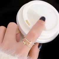 allnewme minimalist shiny rhinestones cross charm rings for women brass gold color thin hollow layered adjusting ring wholesale