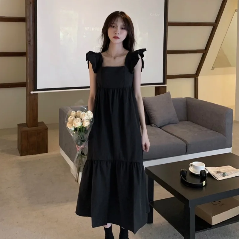 

Black little fly sleeve dress women's summer 2022 new French retro niche design feeling backless long skirt