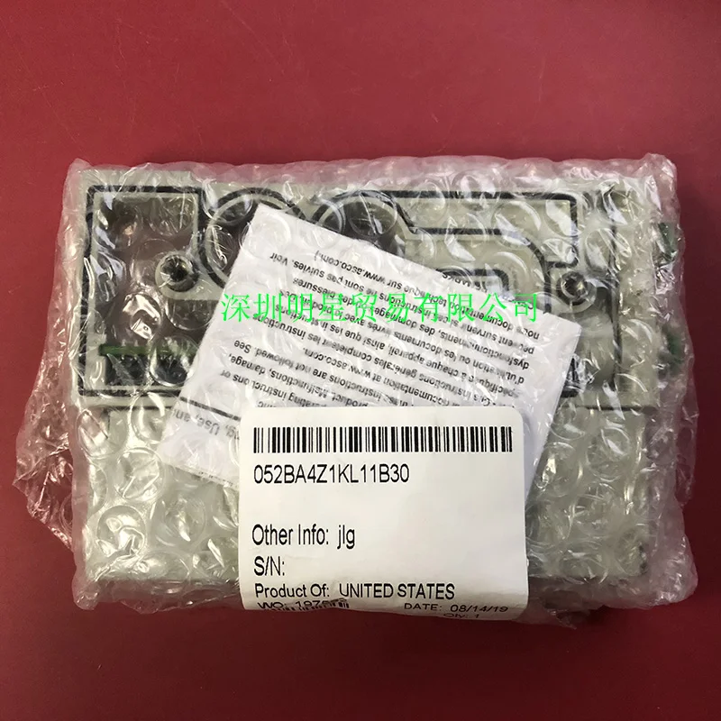 Американский электромагнитный клапан NUMATICS Newmantick 052BA4Z1KL11B30 оригинальный