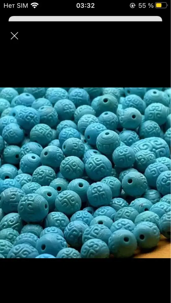 

Turquoise round carved 10mm
