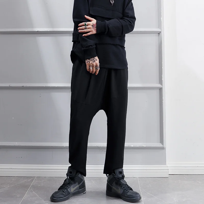 

Брюки спортивные мужские с большим шаговым швом, японские Свободные Штаны, шаровары, трендовые спортивные черные повседневные брюки стрейч...