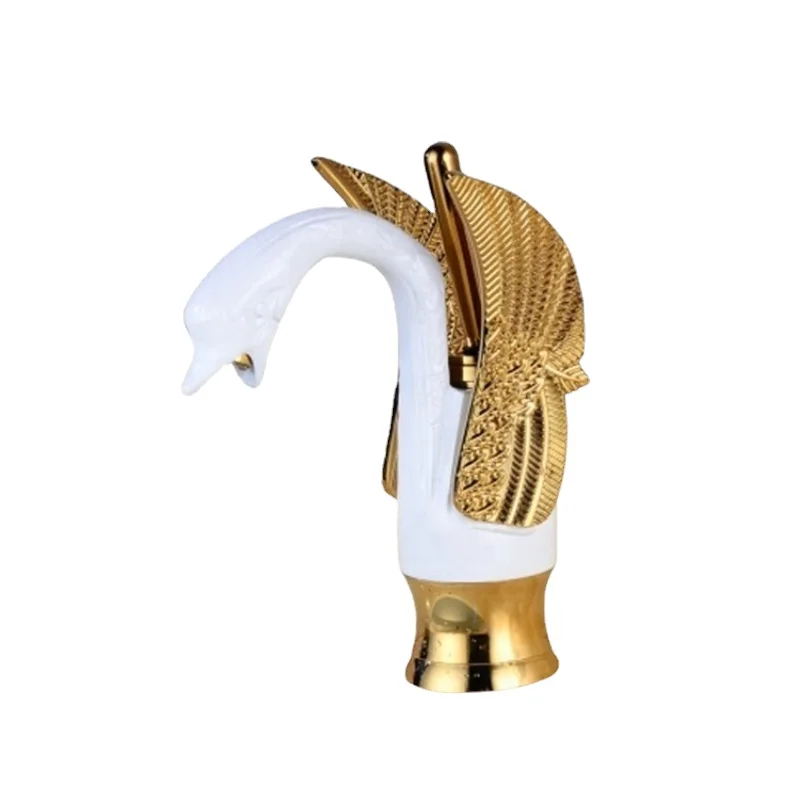 Grifo de latón con forma de cisne dorado y blanco para lavabo...