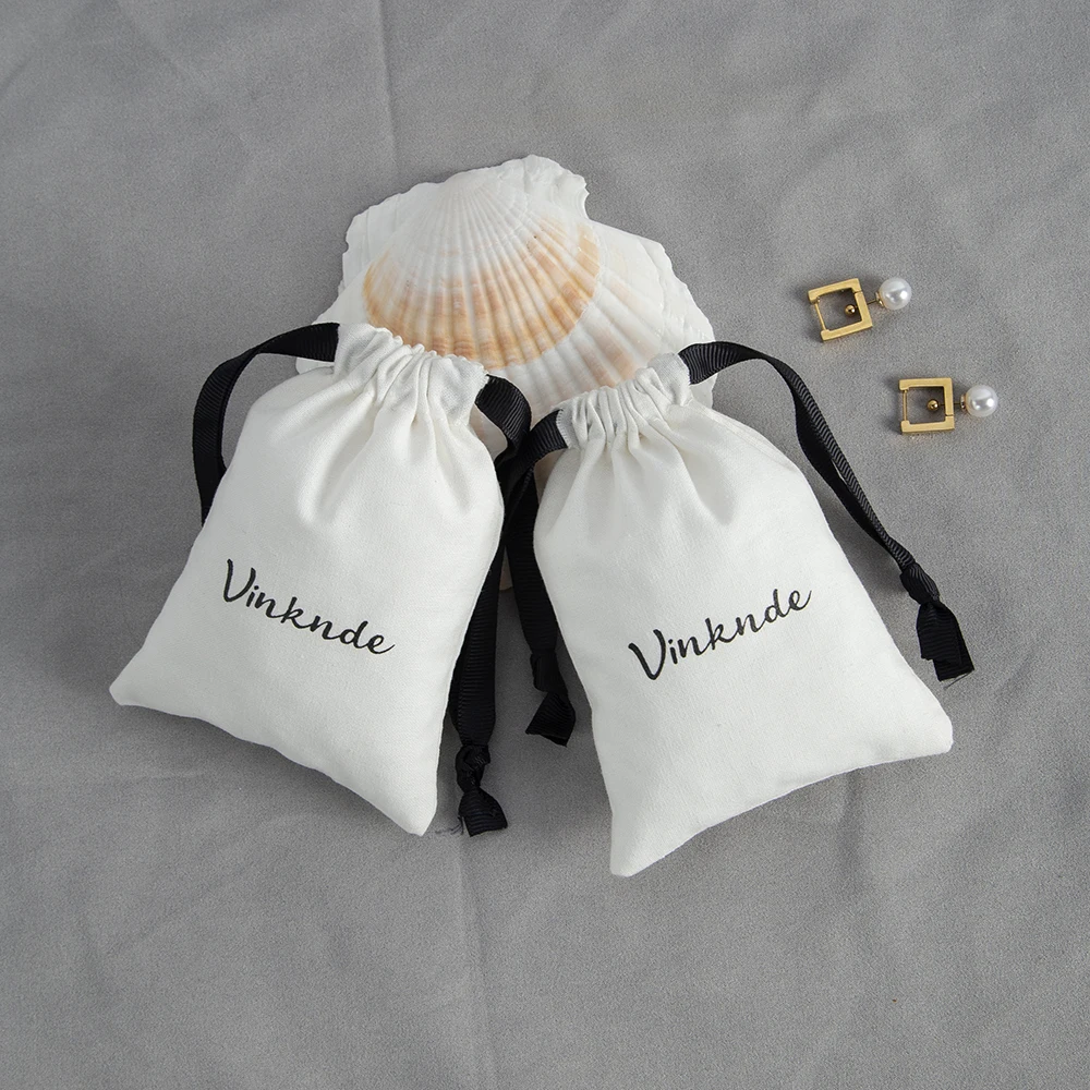 Drawstring Jewelry Gift Bags 100-Pack White Cotton Cloth Pouches With Black Ribbon in Bulk Custom Logo Wedding Favors Candy Bag