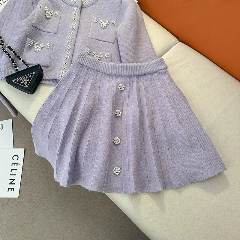 Женский трикотажный костюм элегантный фиолетовый из двух предметов короткая