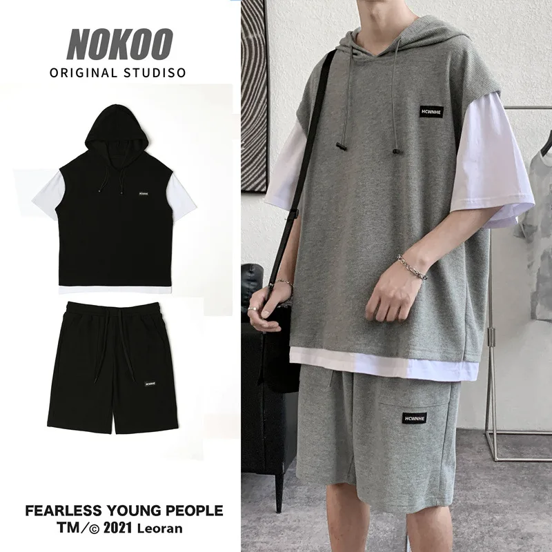 

Summer leisure suit thin style fake two short sleeve T-shirts men's fashion brand loose port style ins handsome matching