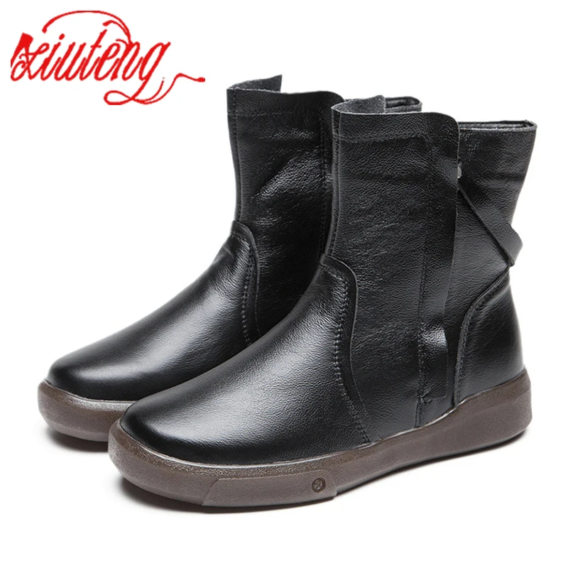 

Xiuteng Cowhide plus velvet warm new boots women's cotton shoes winter women's boots leather soft bottom flat Ankle Boots