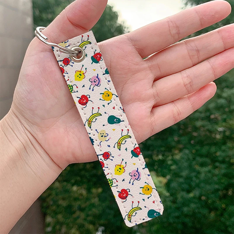 

Fashion Happy Fruits leather motorcycle Custom Key chain Strap Key rings Hanging Holder Bag Wallet Trinket Keychain Hanging Bag