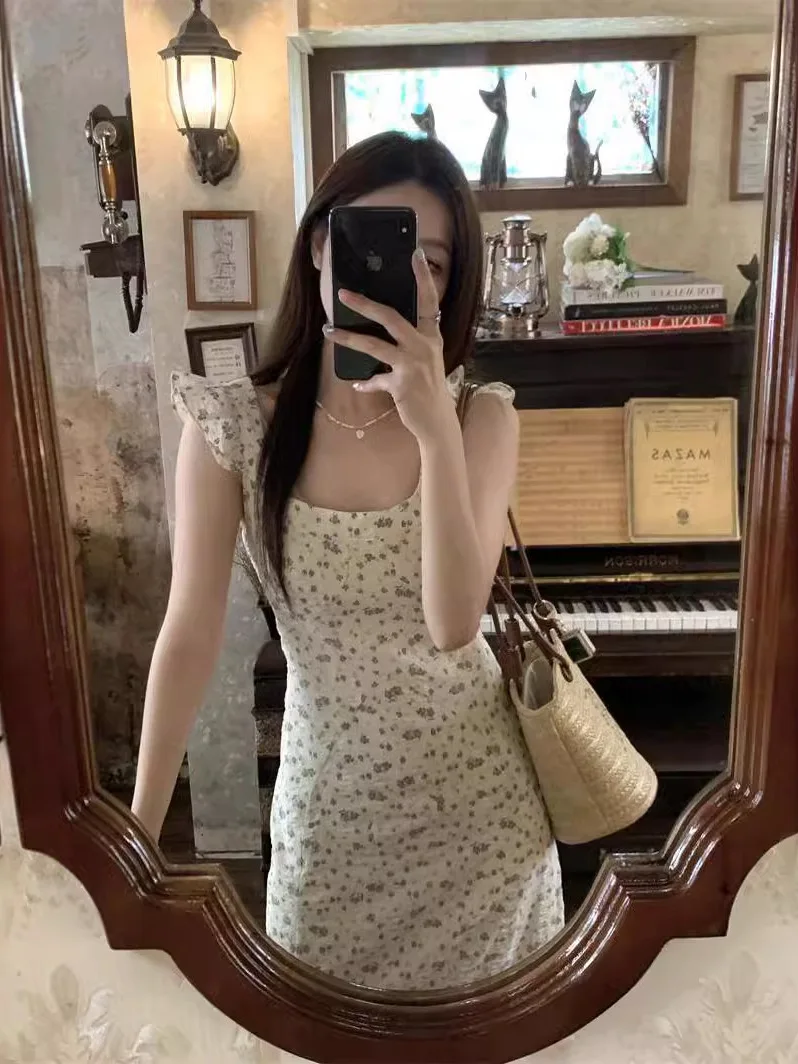 Женское длинное платье с рукавами-фонариками приталенное цветочным принтом