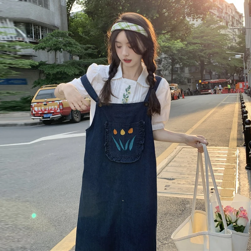 

Denim strap skirt women's summer 2022 new small fresh embroidery design feeling wood ear student loose dress