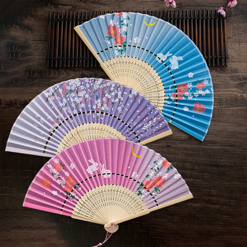 

1PC Creative fan Women's folding fan Imitation silk Printed fan Cloth women's fan Folding fan