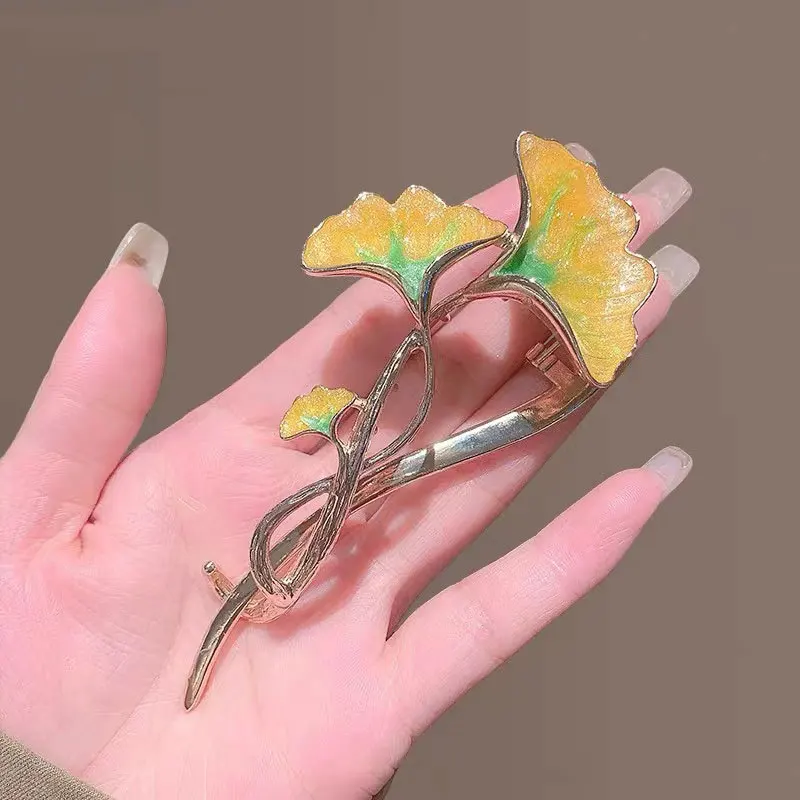 

Металлическая заколка для волос в виде листьев гинкго