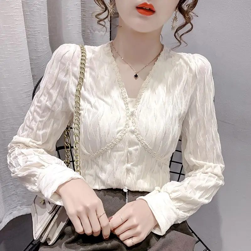 

Blouse 2022 spring and autumn long -sleeved V -neck shirt Women's design sense niche French -style foreign shirt solid lady top