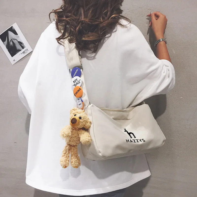 

Hazzys Korean Men's and Women's Handbags Canvas Cameras Postman Backpack Storage Casual Bags