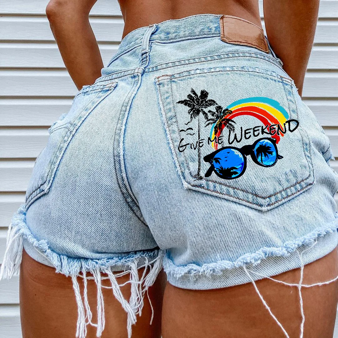 Girly wind leisure travel beach wind pocket print denim shorts ripped tassel fringe shorts hot pants women's summer new