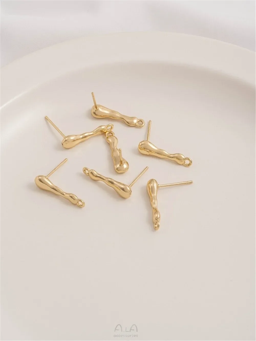 Необычные караст-капли воды в обертке из 14-каратного золота с подвесными