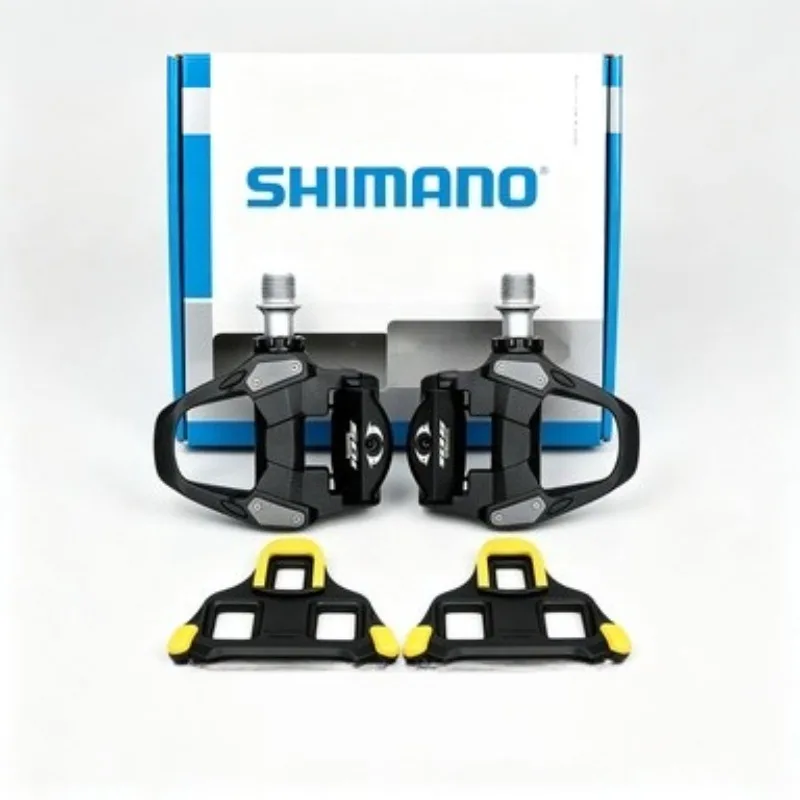 Фото Педали SHIMANO 105 PD-R7000 SPD-SL, карбоновые, для шоссейных велосипедов, с ультраширокой платформой, эффективная передача энергии, система фиксации. №1
