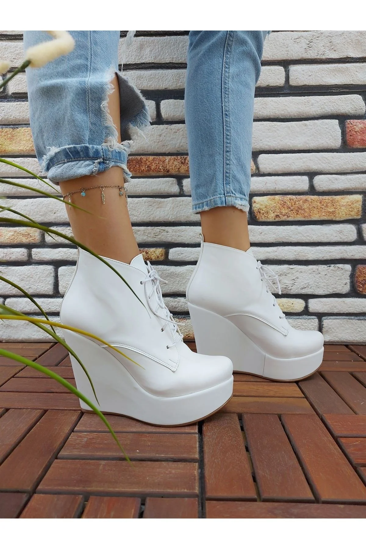 

Rosta White Skin Lace-Up Wedges Boots