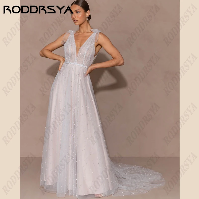

RODDRSYA Sexy V-Neck Backless Wedding Dresses For Women Sleeveless Spaghetti StrapsBride Party A-line Tulle Beach Bridal Gowns