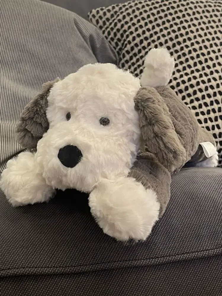 Рисунок 4 - Милая плюшевая игрушка в виде собаки-лежа