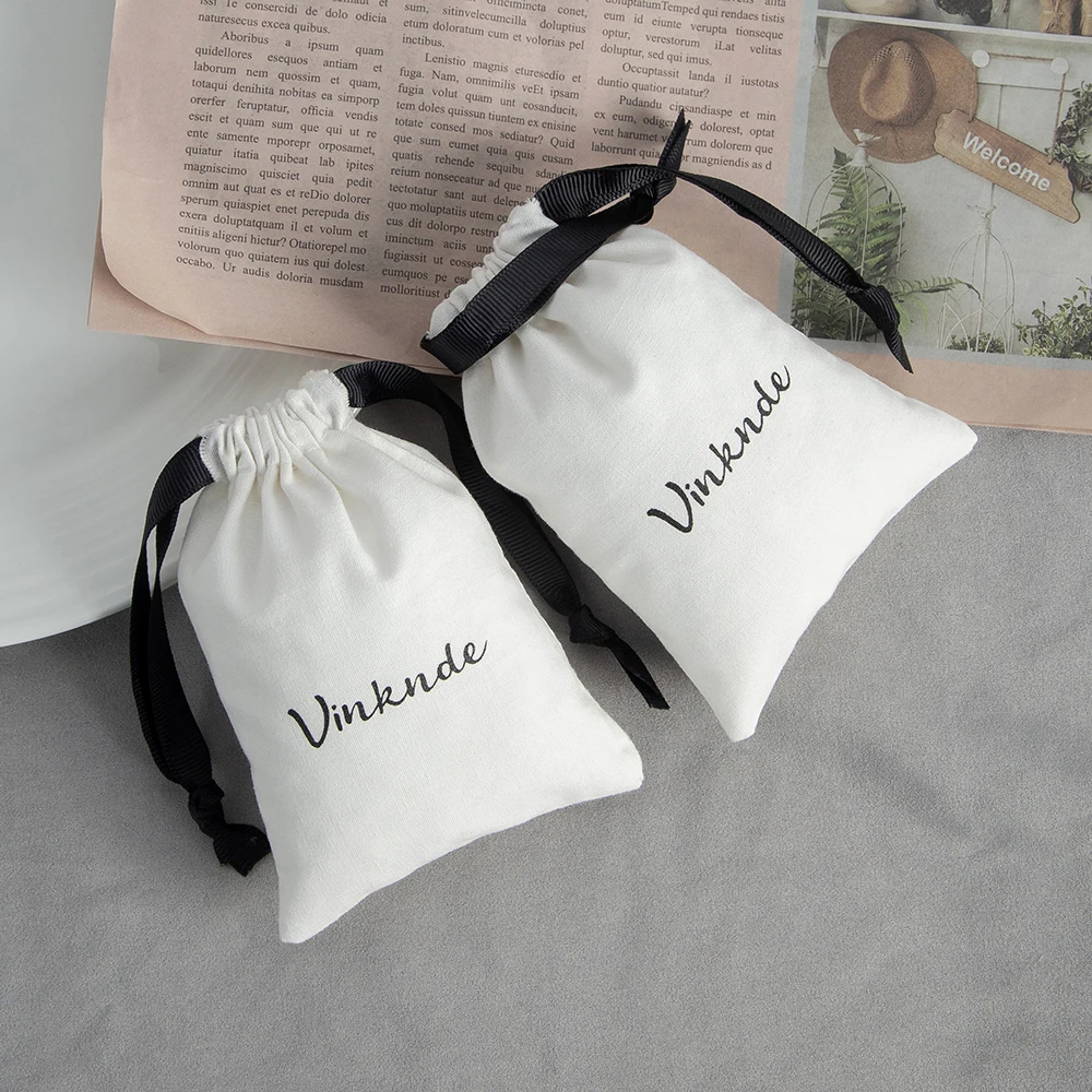 Drawstring Jewelry Gift Bags 100-Pack White Cotton Cloth Pouches With Black Ribbon in Bulk Custom Logo Wedding Favors Candy Bag