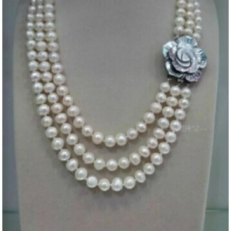 Три тройных фотообои с белым жемчугом Три тройных фотообои с белым жемчугом